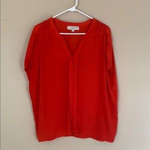 Red Sleeveless Blouse